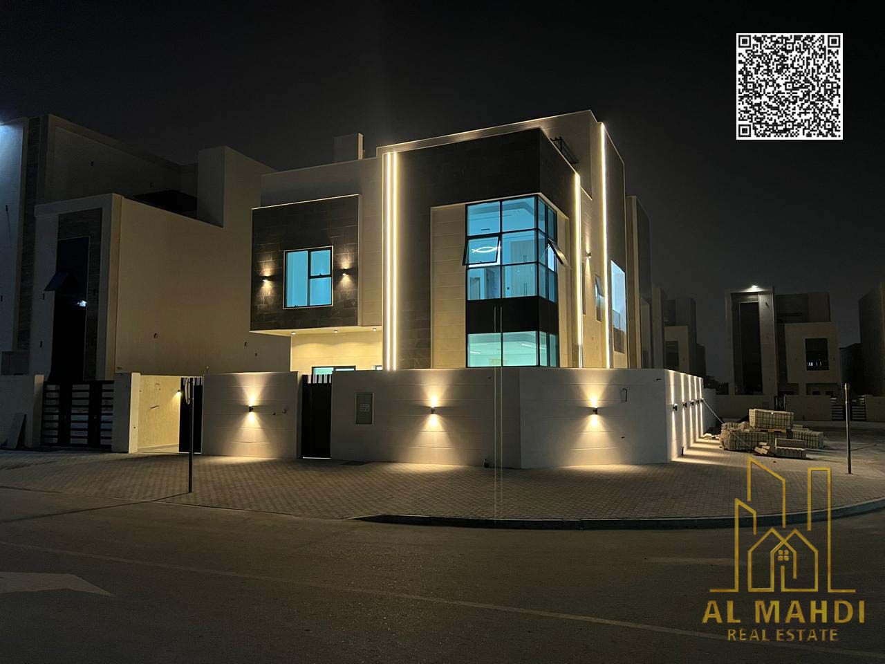 Corner villa for sale in Al Helio 2 Ajman 6 master bedrooms with majlis 2 living rooms kitchens rooftop and yard registration included