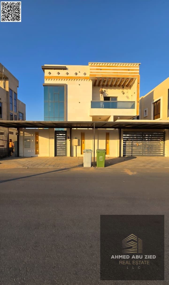 Villa for rent in Al Yasmin, directly opposite a mosque, 5 master bedrooms + maid's room, 7 bathrooms, majlis, lounge and garden, equipped kitchen and