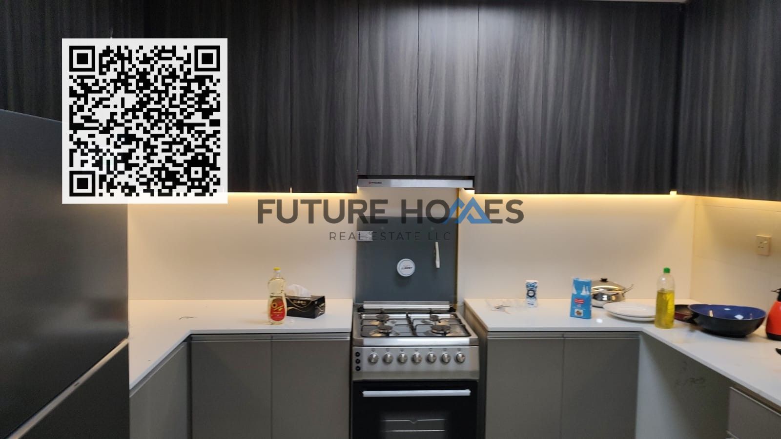 A furnished residential unit with one Bedroom, a Hall (living room), and a Kitchen with Parking in Gulfa Tower Ajman