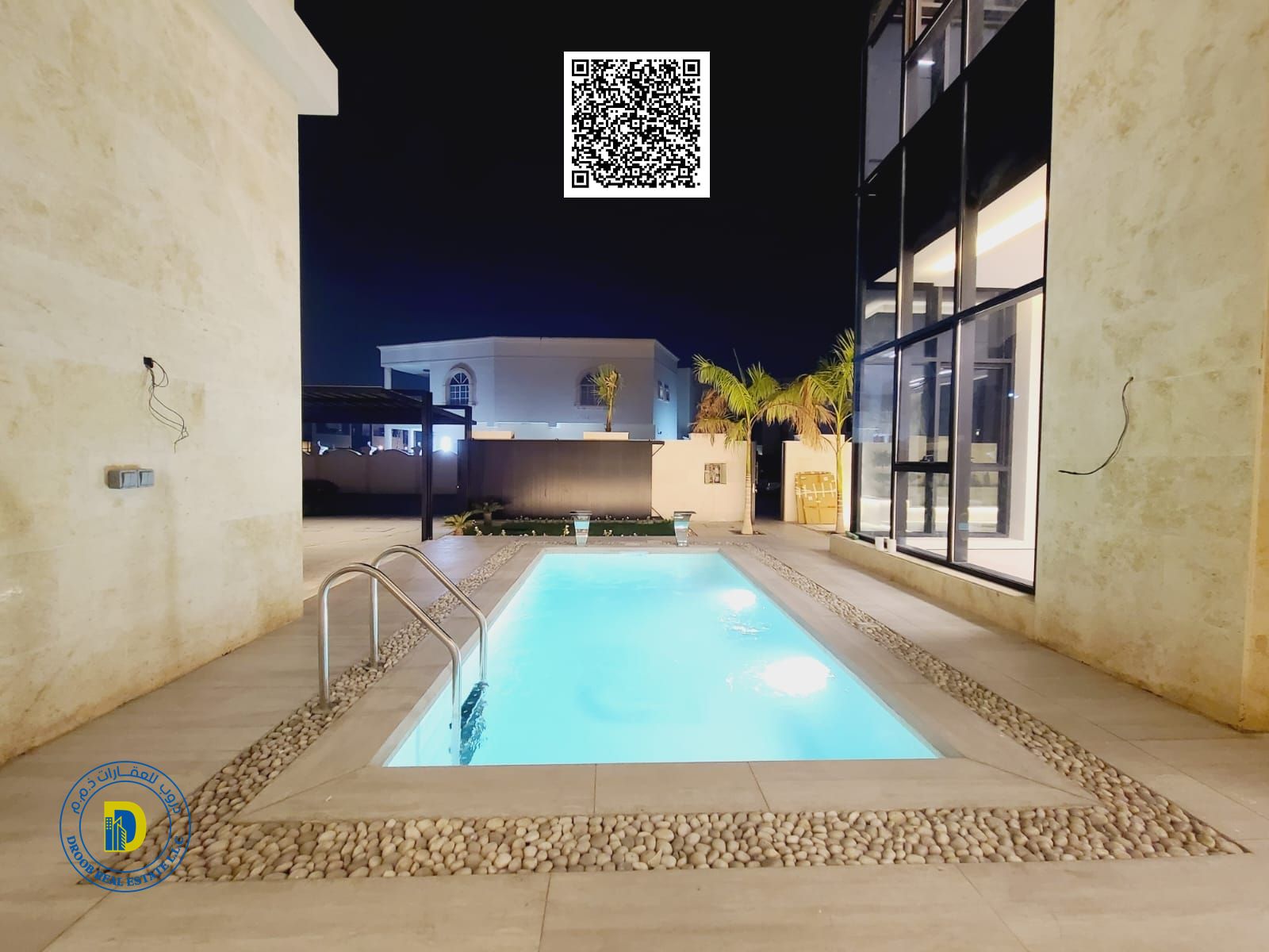 Prime location in Al Yasmin, luxury villa with 6 bedrooms, roof terrace, and swimming pool, including electricity, water, and air conditioning.