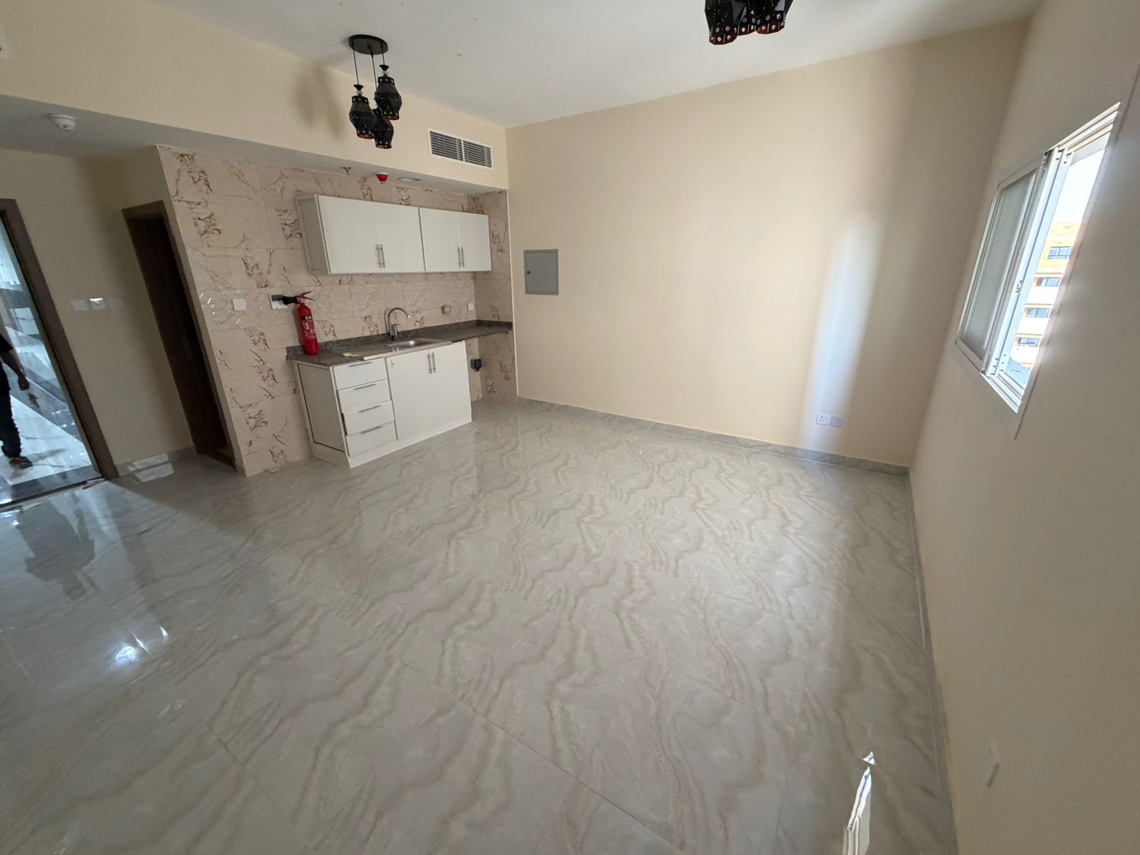 Studio apartment for annual rent in Ajman, first occupancy, Al Jurf 3 area, near the Tribal Center and the Chinese Market.