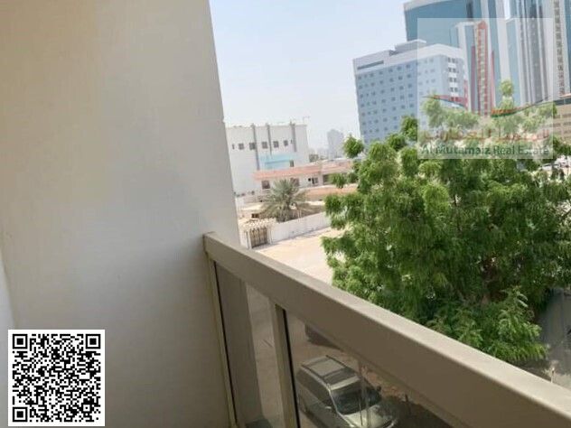 For annual rent in Ajman, a room and a hall in the Iqbal Building in Al Bustan. The required amount is 26000 in installments