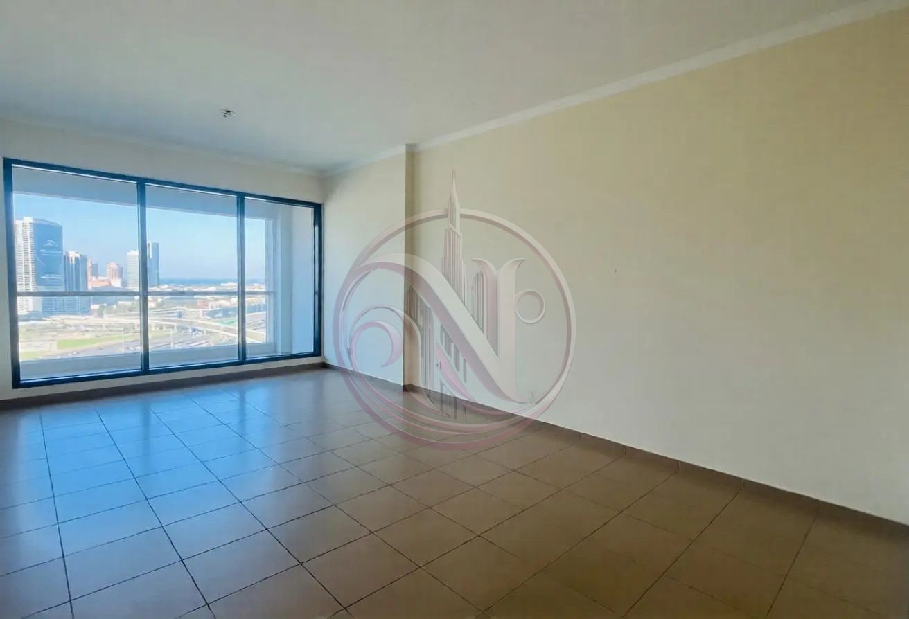 Spacious 1BR Apartment | High Floor | Vacant | Unfurnished | Lake View