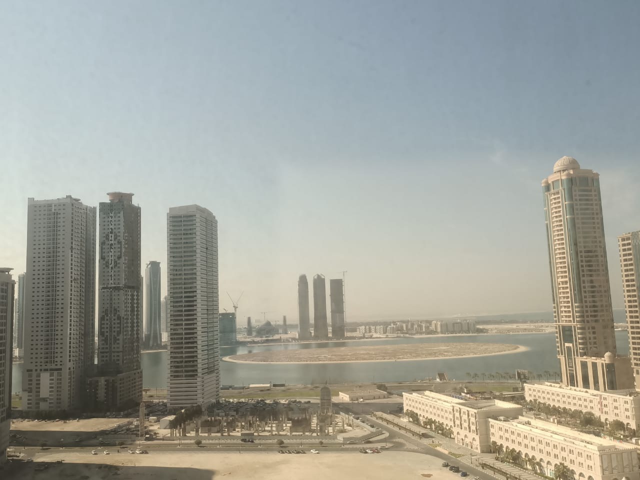 Free parking | Spacious areas | Built-in wardrobes | Sea view | Free maintenance | Central AC - gas | Near Al Qasba | Dubai exit | New family tower