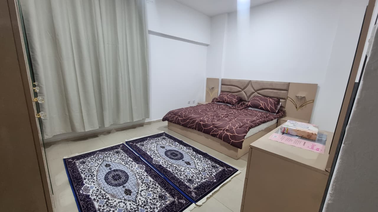 Monthly furnished 1BR, fully equipped, spacious, clean family building, first tenant, central AC, prime location near the Corniche