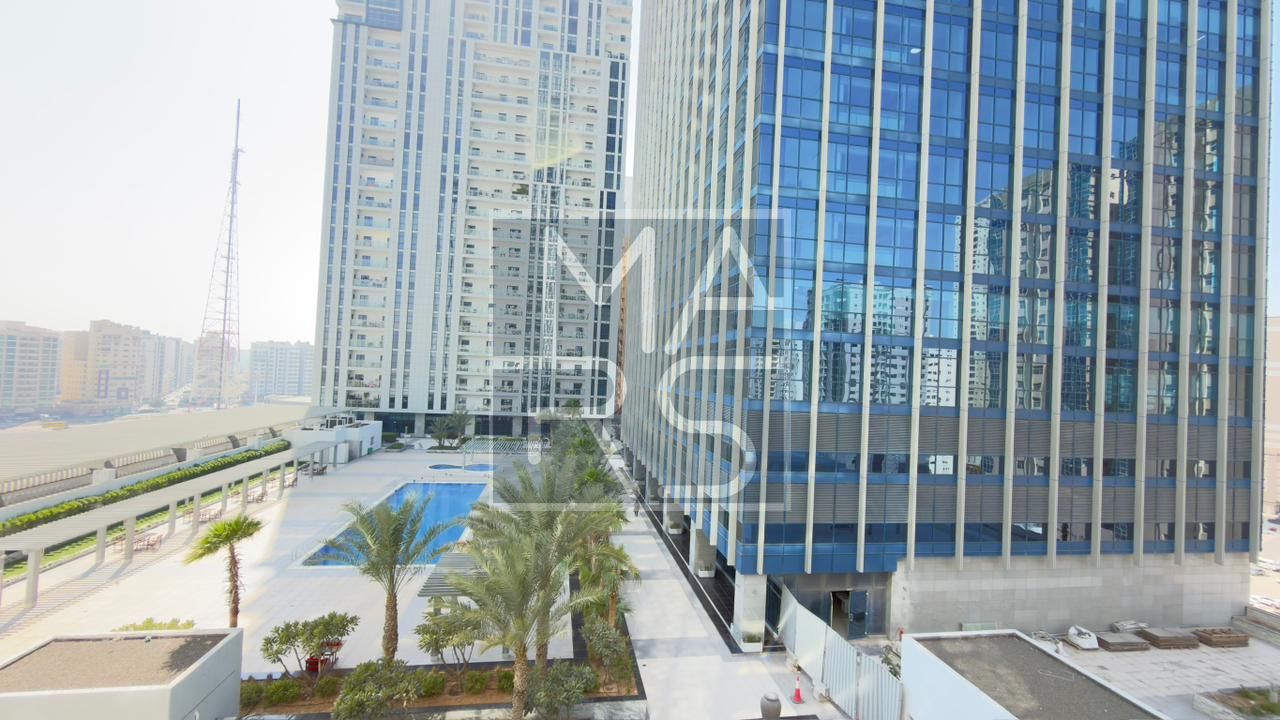 Spacious 3BR Apartment with Maid’s Room & Pool View