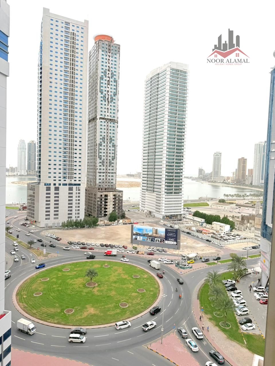 Sharjah, Al Taawun area: Two-bedroom apartment with a living room, kitchen, two bathrooms, and a balcony.