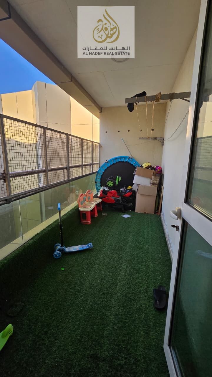 One bedroom and living room with two bathrooms, a large hallway, and built-in wardrobes. The largest space in Ajman, high floor, and open view.