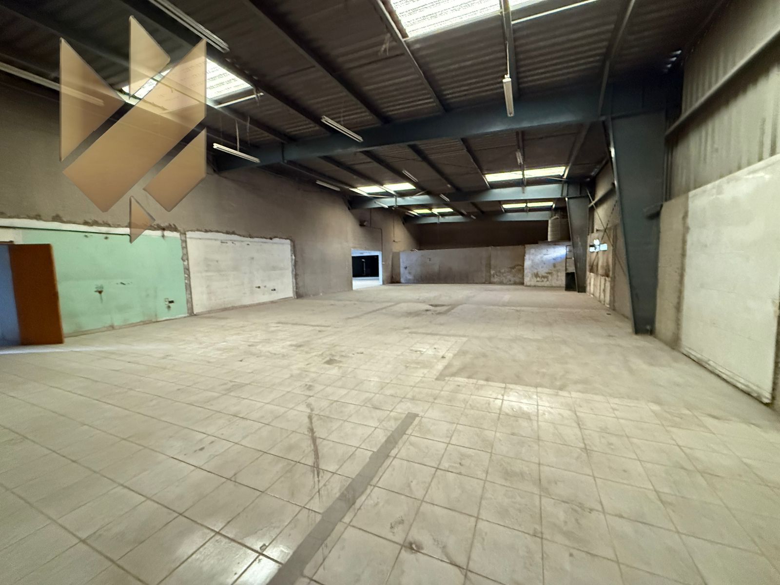 Warehouse on a main street in Industrial Area 10, 110 kW capacity.