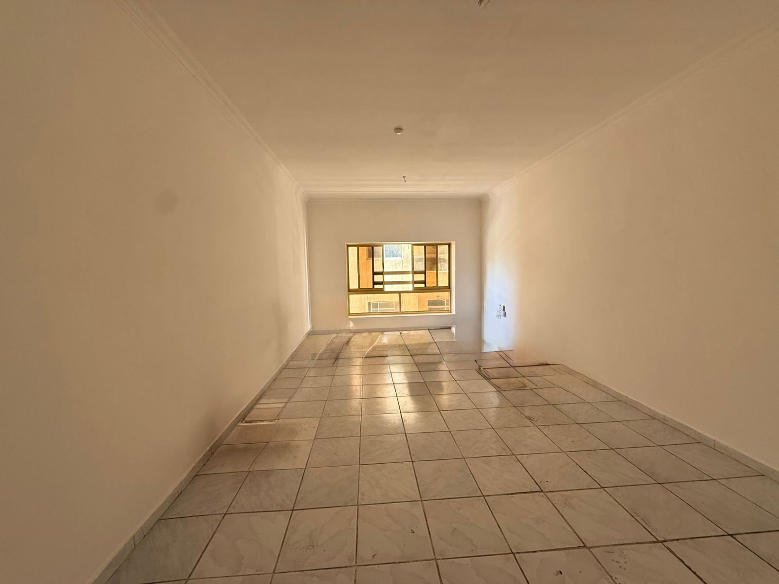 Free parking, central AC, balcony with open view, spacious layout, family residence.