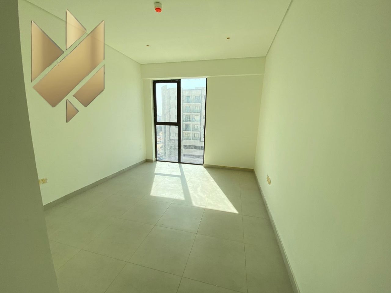 Two bedrooms and a living room, first occupancy in Al Zahia, with parking and free swimming pool. Prime location near Claro Cafe.