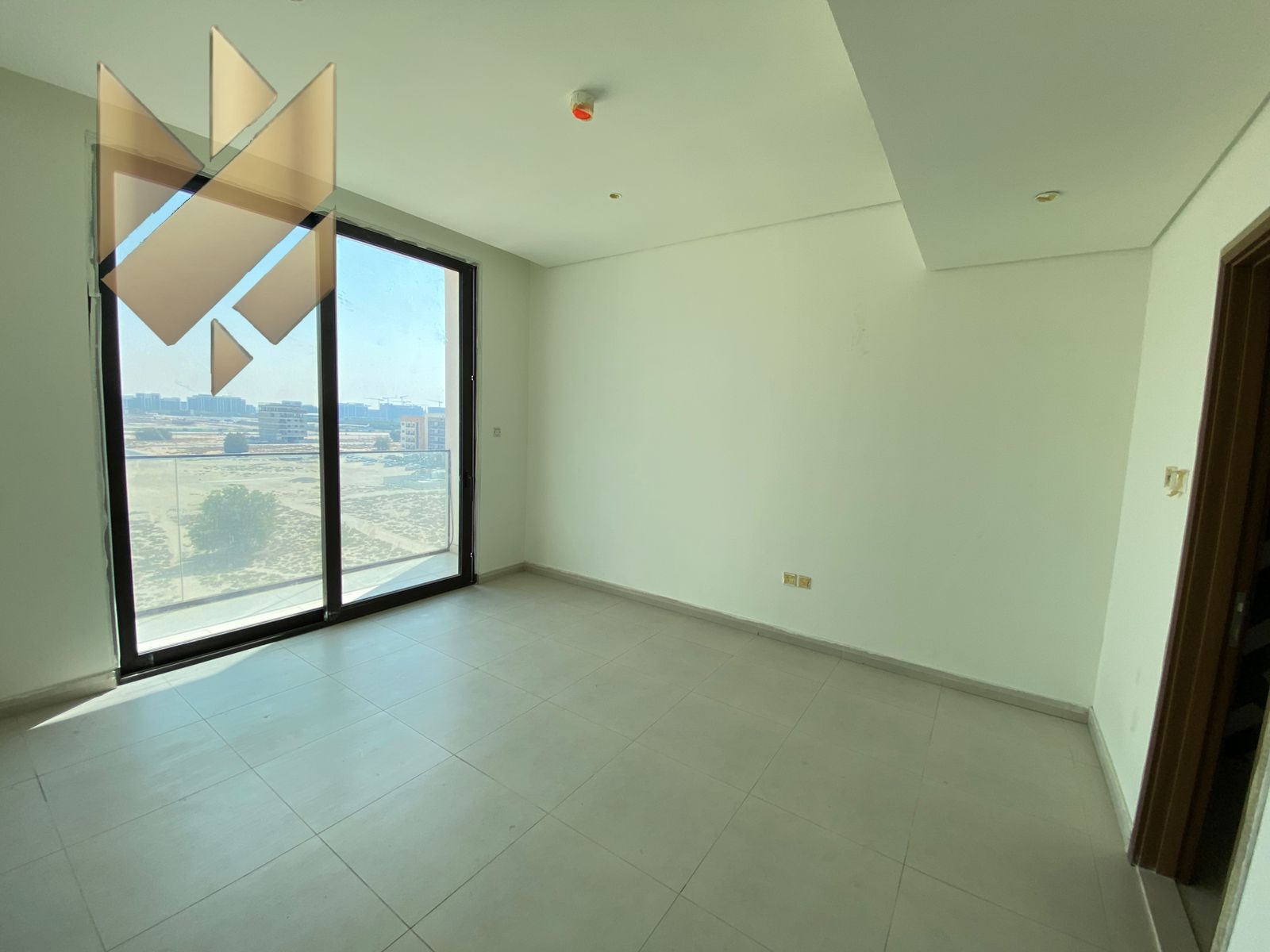Direct from Owner – First Tenant: 2-Bedroom Apartment with Living Room, Parking, and Free Pool in Al Zahia
