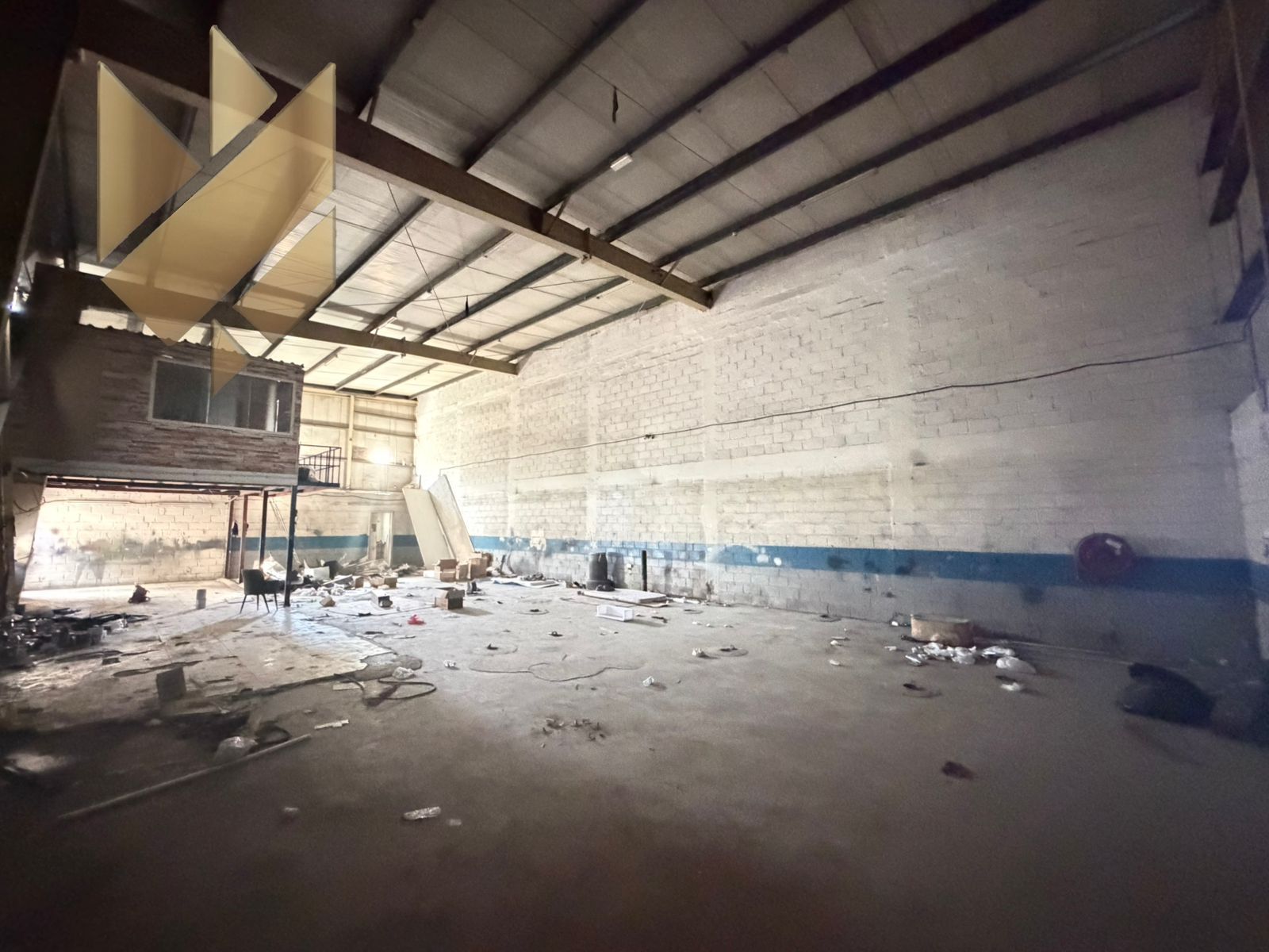Suitable warehouse/garage in Industrial Area 2, with an area of 3000 square feet.