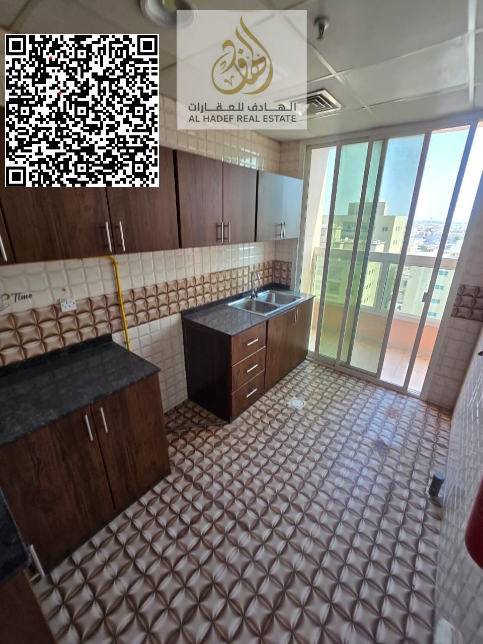 One bedroom, living room, balcony, two bathrooms, kitchen, central gas, Al Rawda area