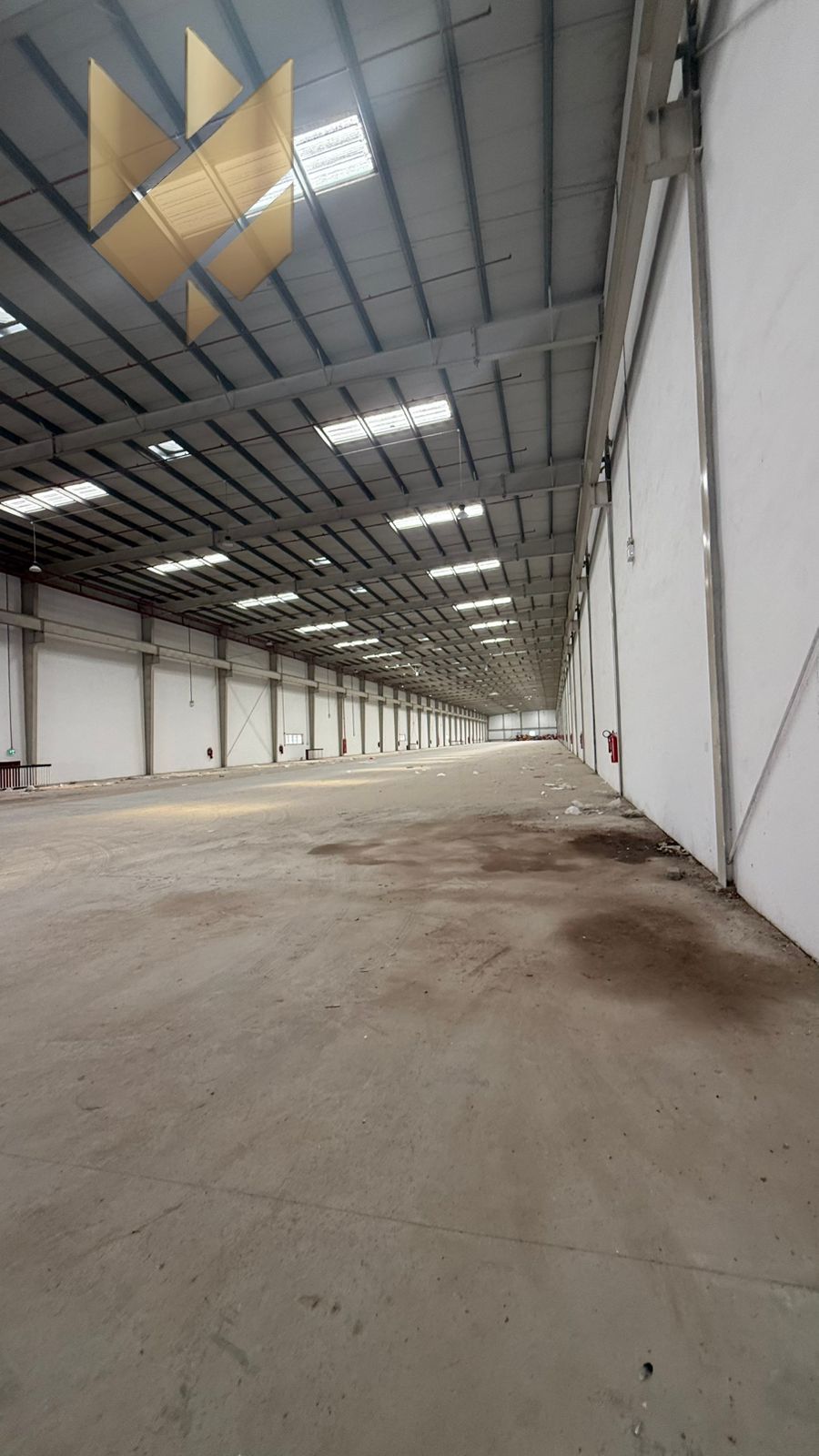 Warehouse in Al Saja’a Industrial Area with 60,000 sqft, office, bathroom, 7 parking spaces, high power supply, priced at 2,700,000 on 4 payments with
