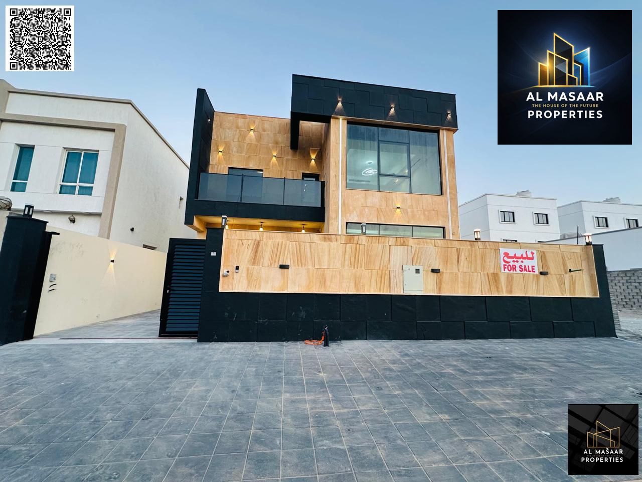 Luxury villa for sale in Al Zahia, Ajman. High-end finishing, prime location. Price includes registration fees, utilities, and freehold ownership for