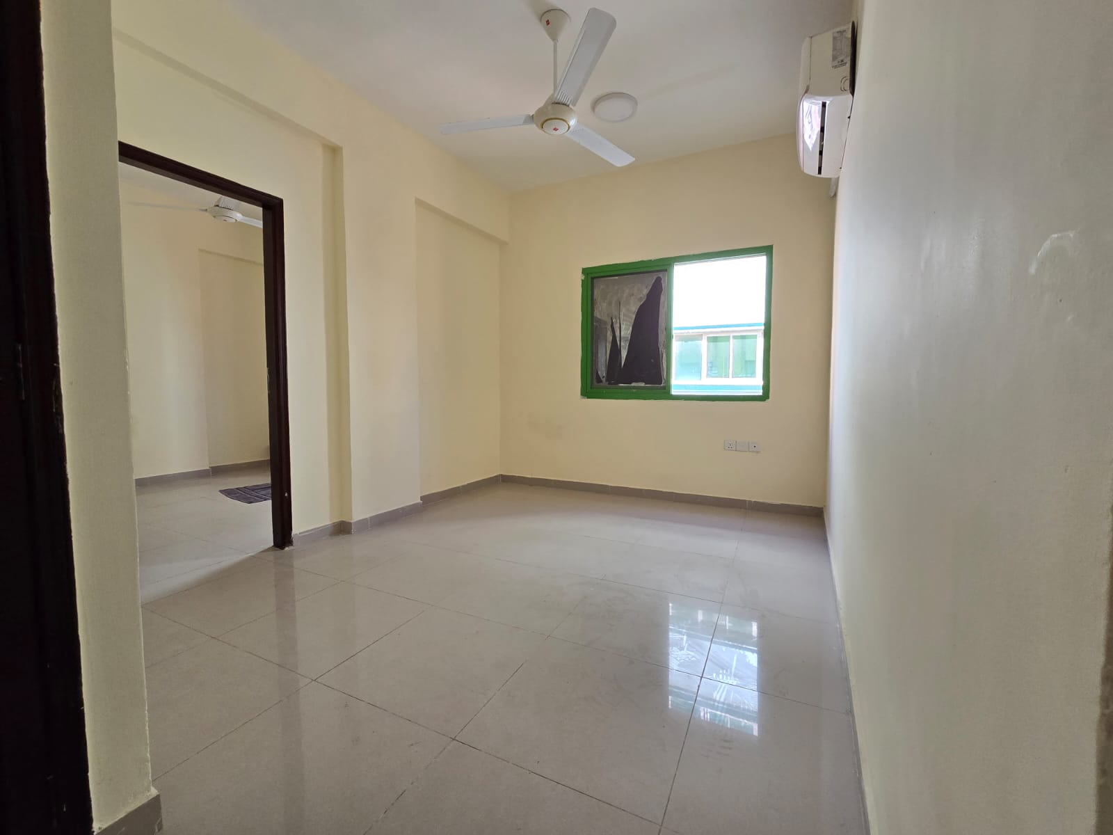 Apartment for rent in Ajman, two bedrooms and a living room, no elevator, Ajman Corniche area, second row from the Corniche, near Bahi Palace and the
