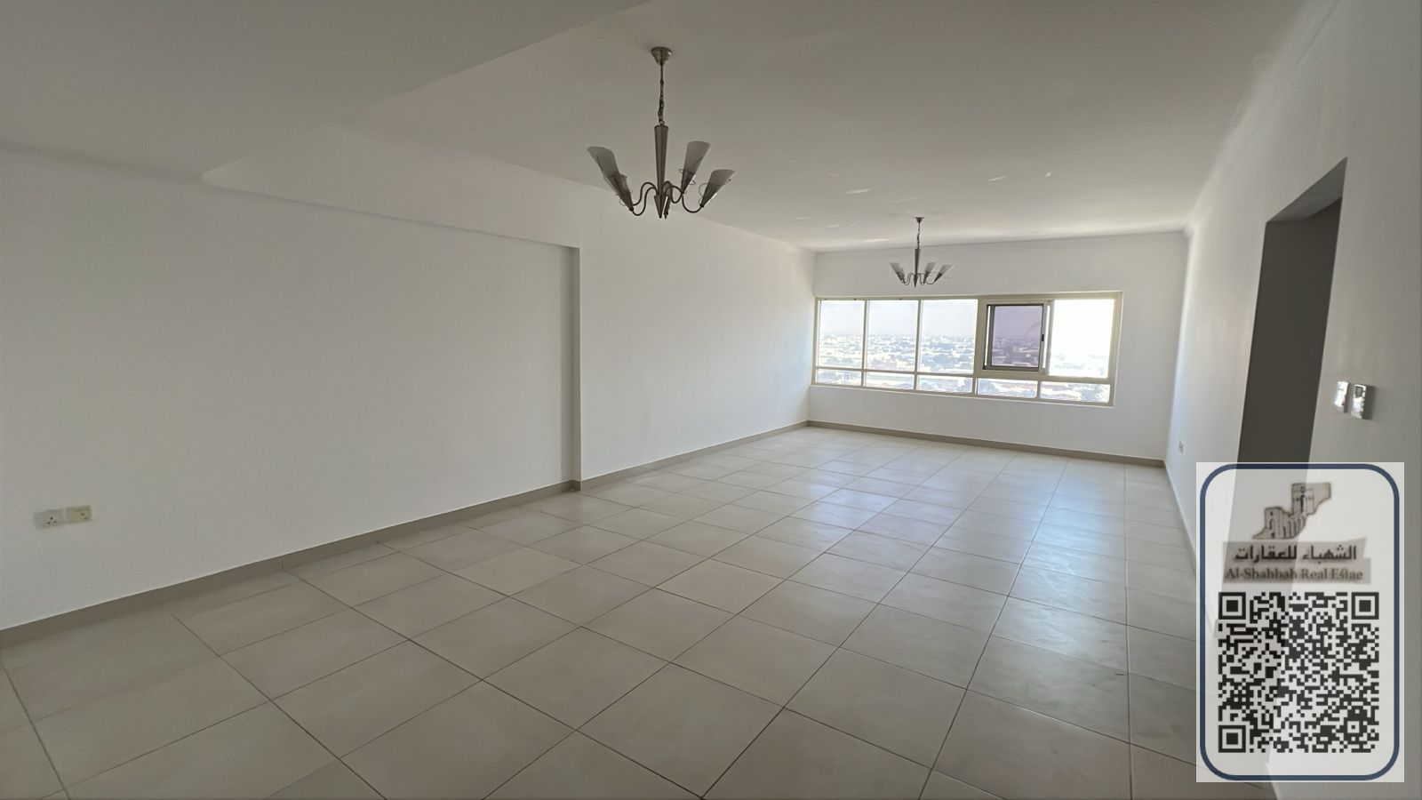 Two bedrooms and a living room with a full open view, a minimum area of 1800 square feet, next to Emirates Markets.