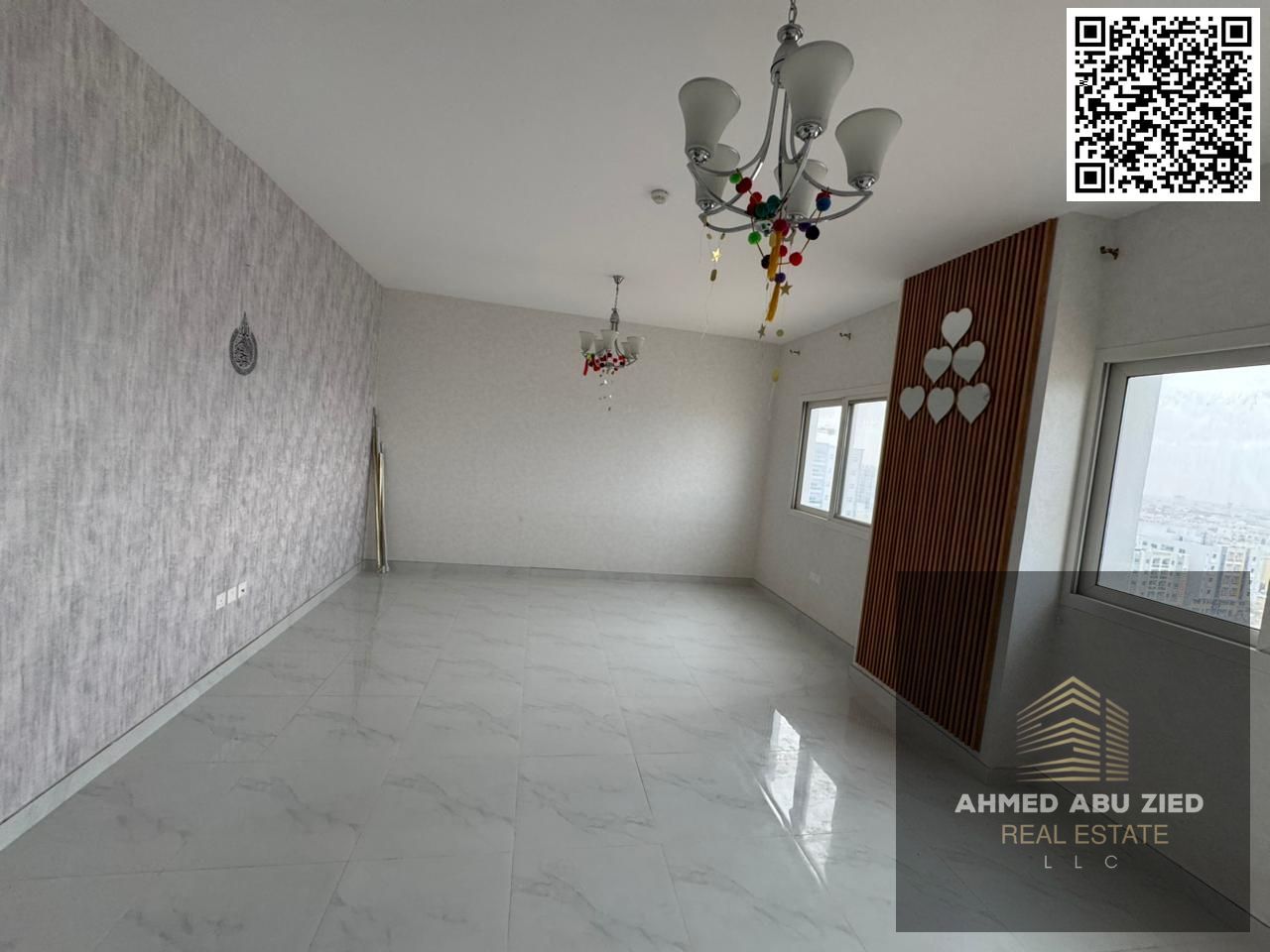 Luxury two-bedroom apartment with a living room in Al Jurf 3 | 3 bathrooms | Balcony with open views | Central air conditioning | Free parking | First