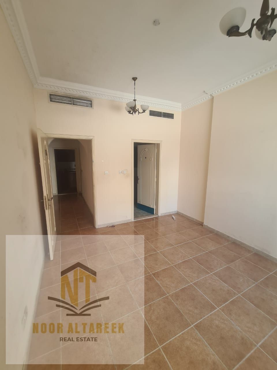 Professional and attractive ad: Apartment for annual rent in Al Qasimia – Al Mahatta, Sharjah, featuring **1 master bedroom and a spacious living roo
