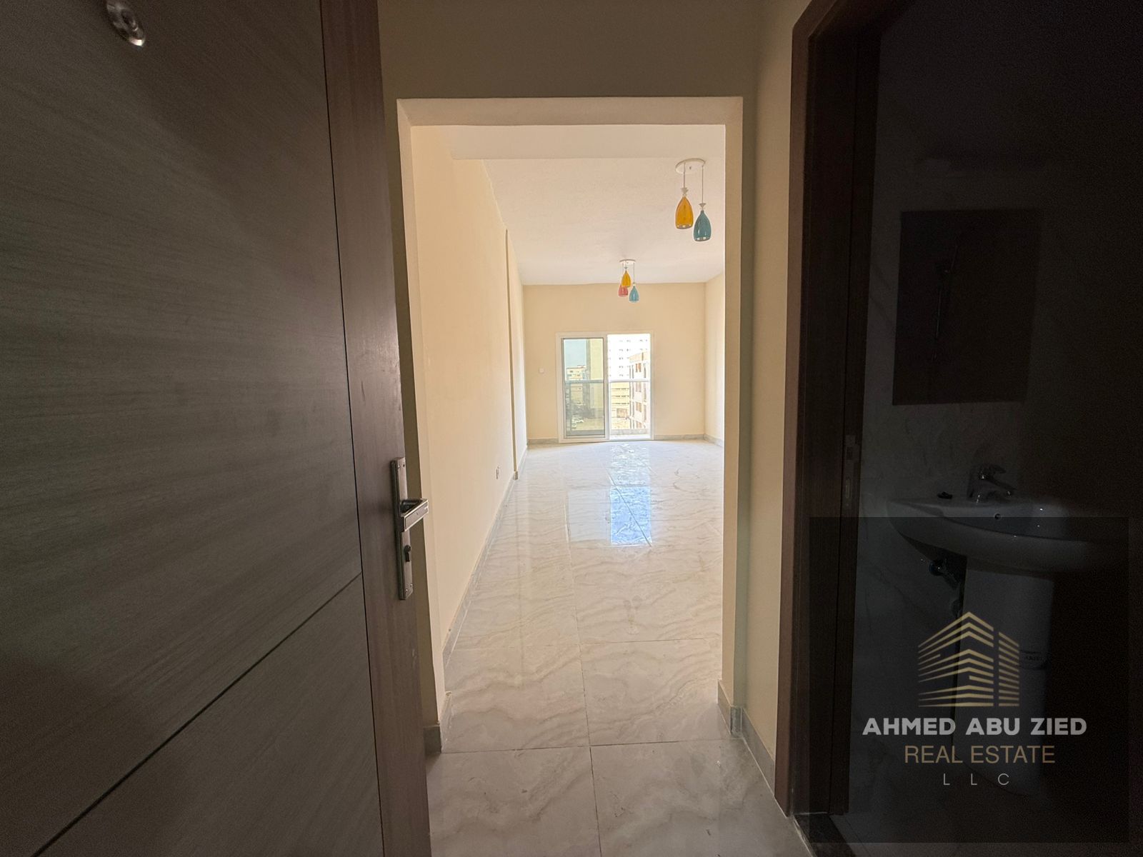 Spacious 1-Bedroom Apartment with Living Room < 2 Bathrooms . Fully Equipped Kitchen – Balcony with Open View, Natural Lighting, and Ventilation Loca
