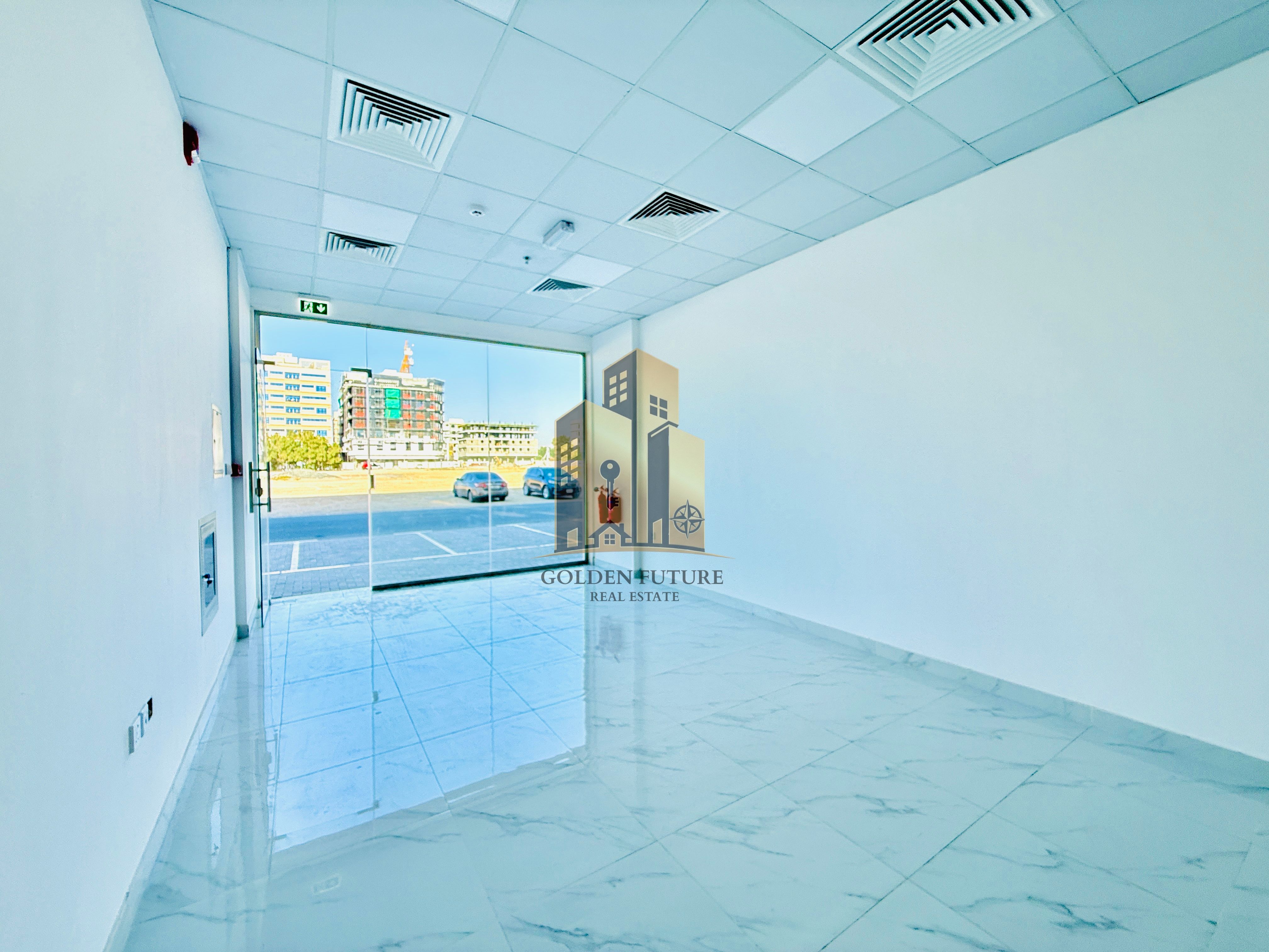 Spacious shop under brand new building hot location reasonable price