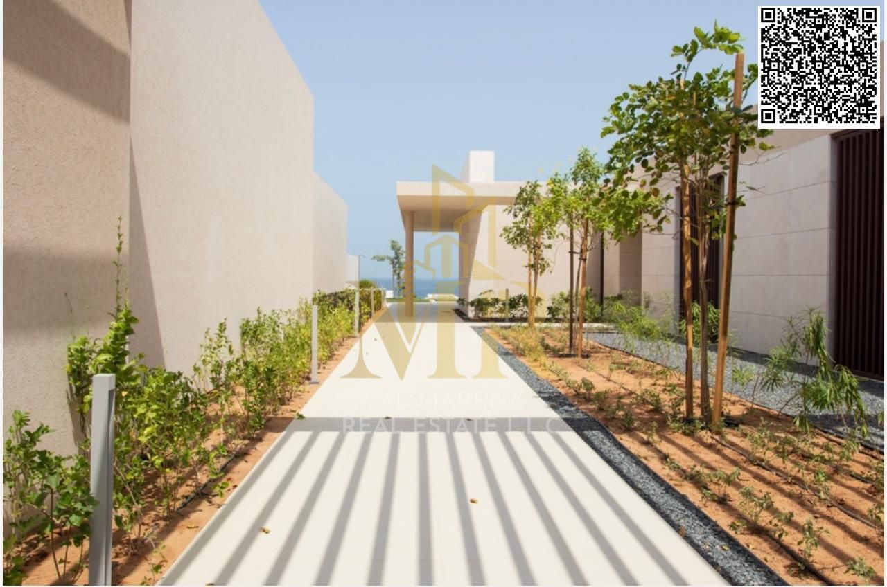 Luxury villa for sale directly on Al Zorah Beach – 4 master bedrooms with swimming pool and gardens