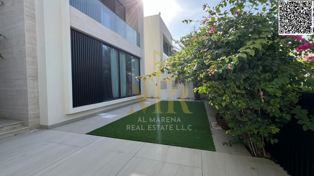 Luxury villa for sale in Al Zorah with a direct view of the golf course, price includes electricity, water and air conditioning