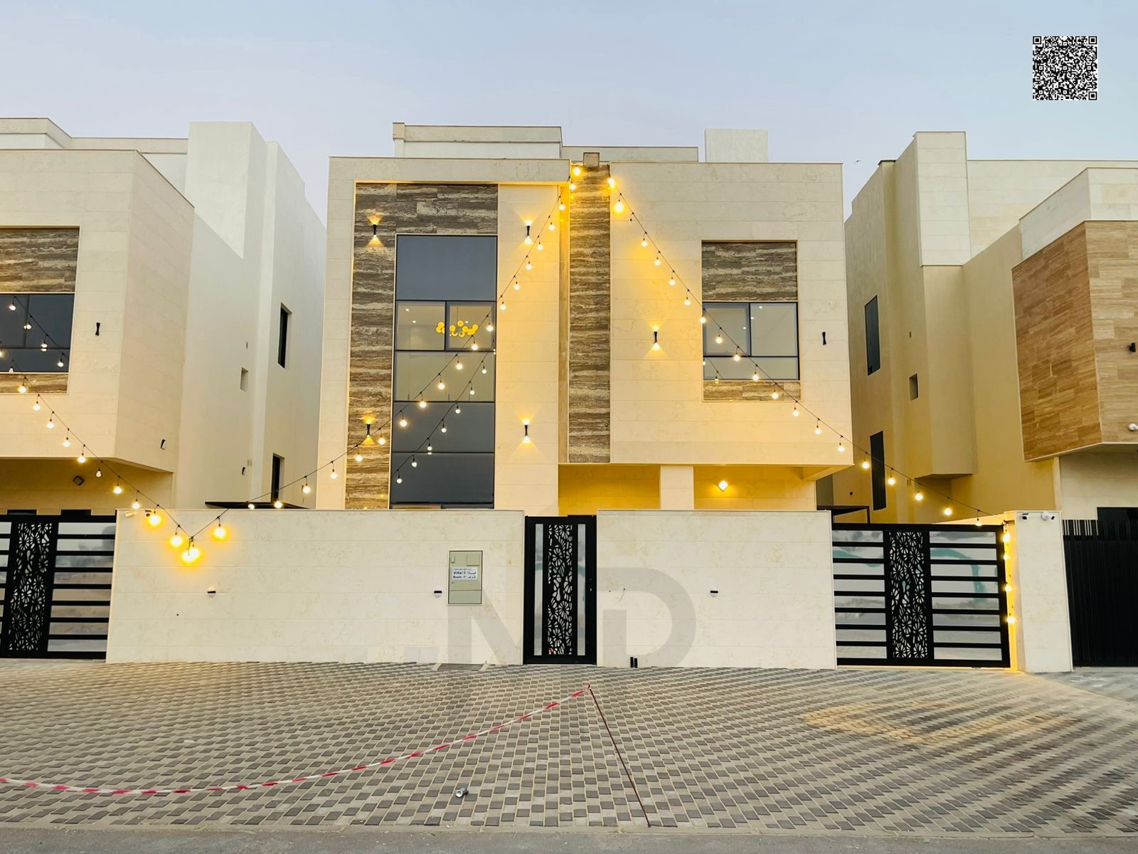 A luxurious villa with two floors + a roof with an elegant modern design, including 7 master bedrooms, an elegant living room, a spacious hall and a m