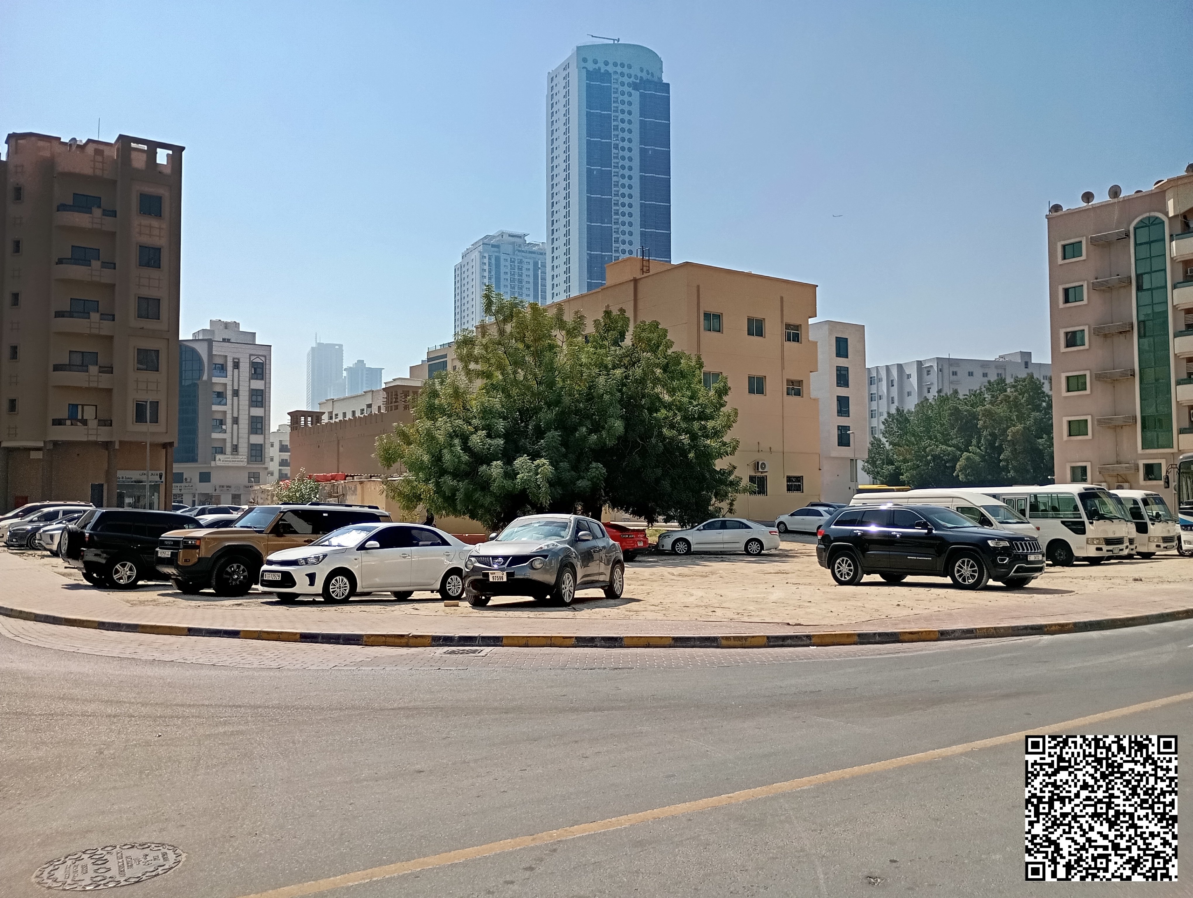 Corner commercial land (G+6) near the Corniche and Sheikh Humaid bin Rashid Street.