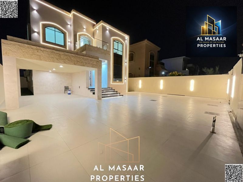 Upscale, with a modern design, located in Al Muwaihat 1, featuring spacious areas and high-quality finishes, with an ideal location directly opposite