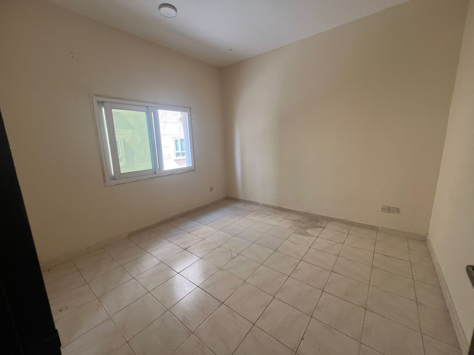 One bedroom and living room in Al Butina, spacious area, free maintenance