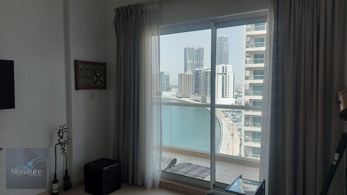 1BR | Corner | Canal and Burj View