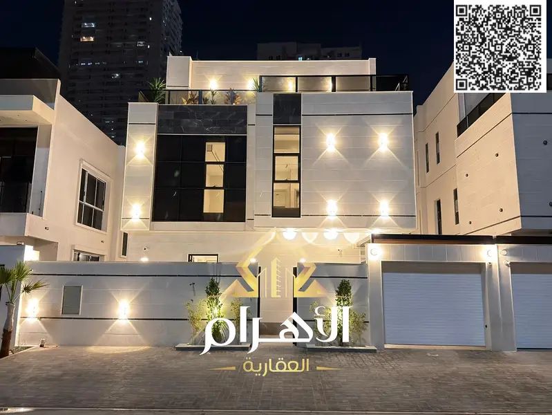 Luxury villa in Al Amrah, Ajman, ready for immediate occupancy, featuring high-end finishes and spacious living areas.