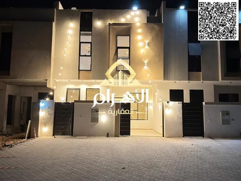 Luxury villa in Al Helio 1, Ajman, ready for immediate occupancy with high-end finishes and spacious living areas.