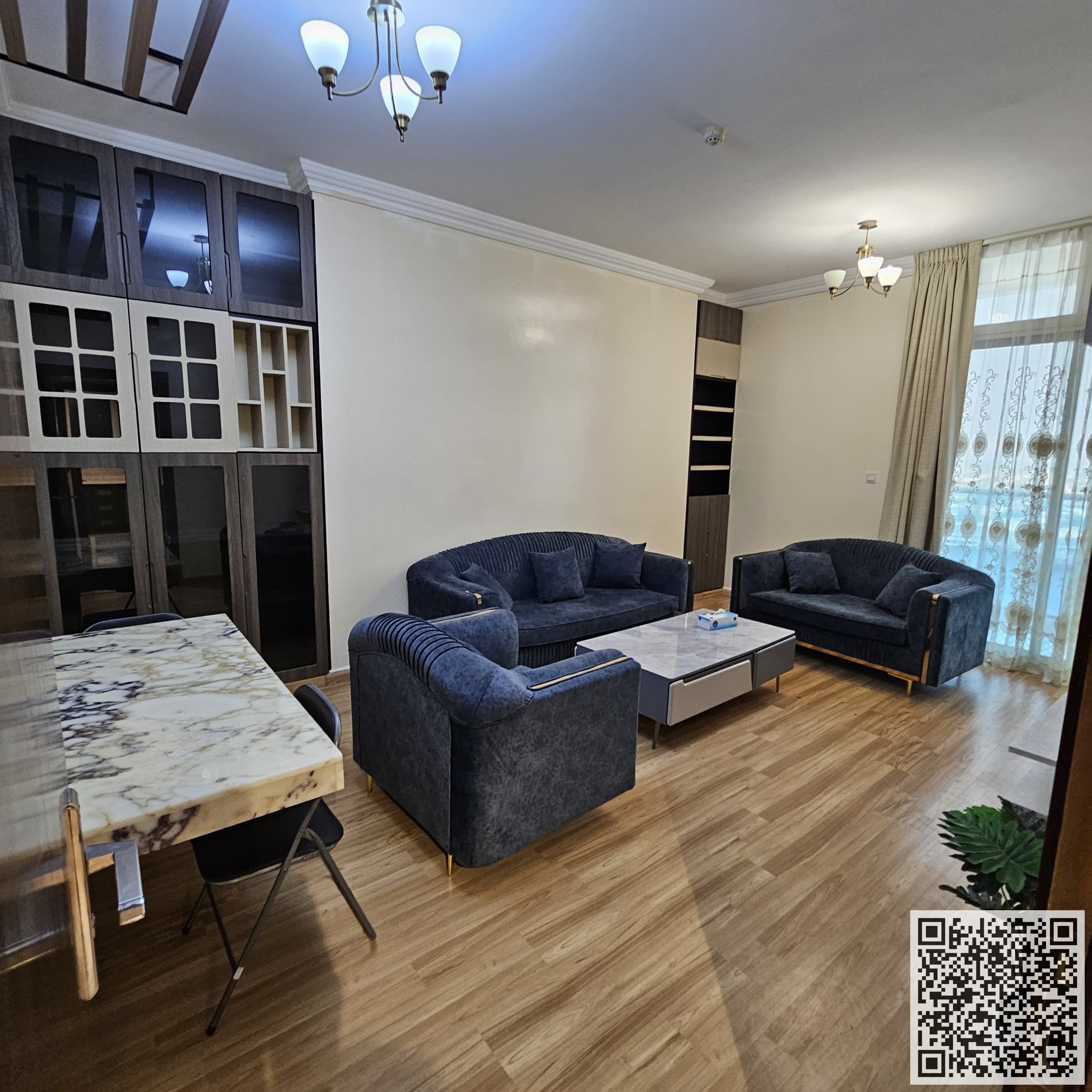 Furnished Two-bedroom apartment with an open view available for monthly rent in Ajman Oasis Towers Includes bills and internet Gym, pool, parking