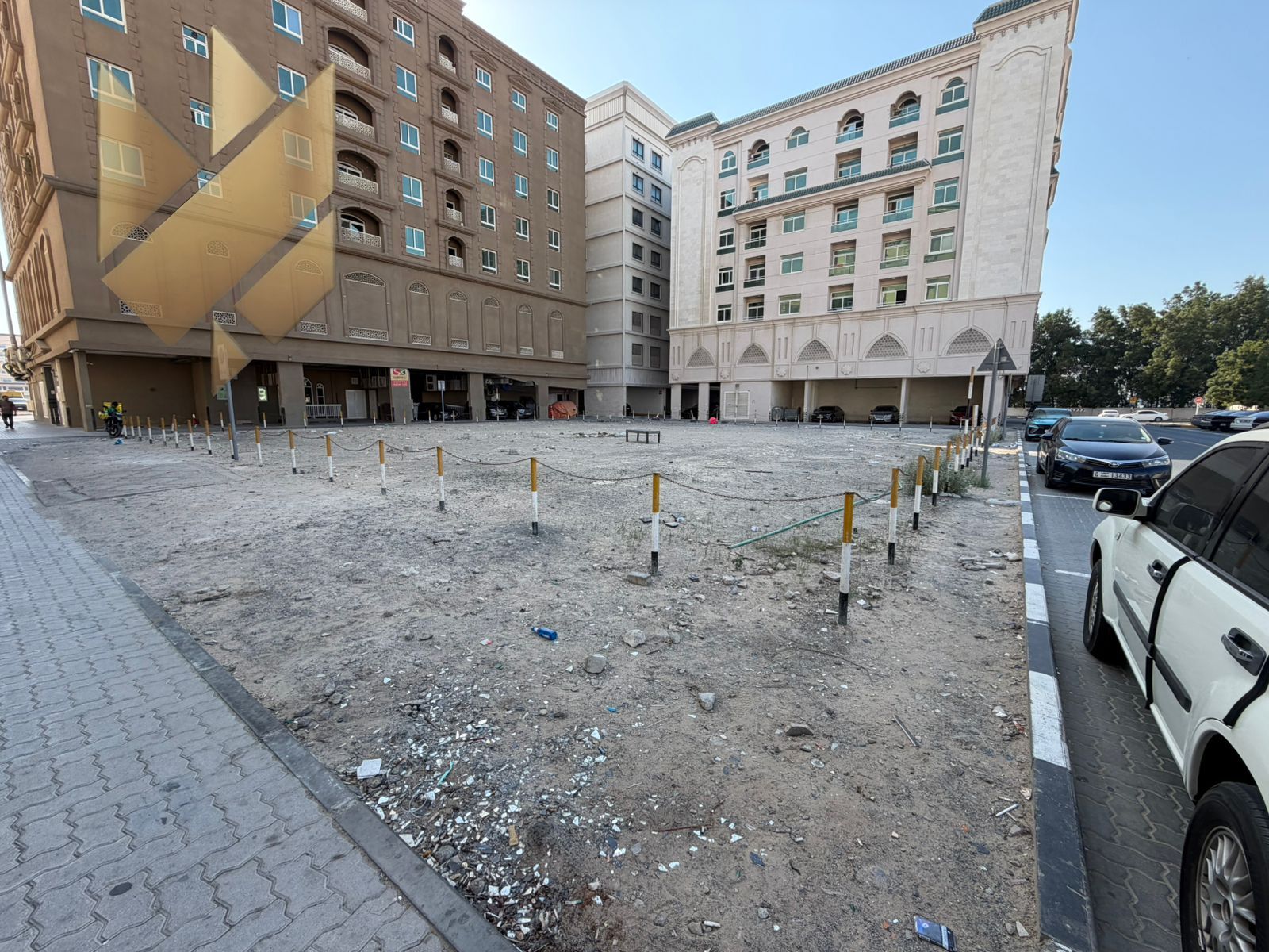 Investment parking space in New Muwailih, strategically located opposite City Centre Al Zahia