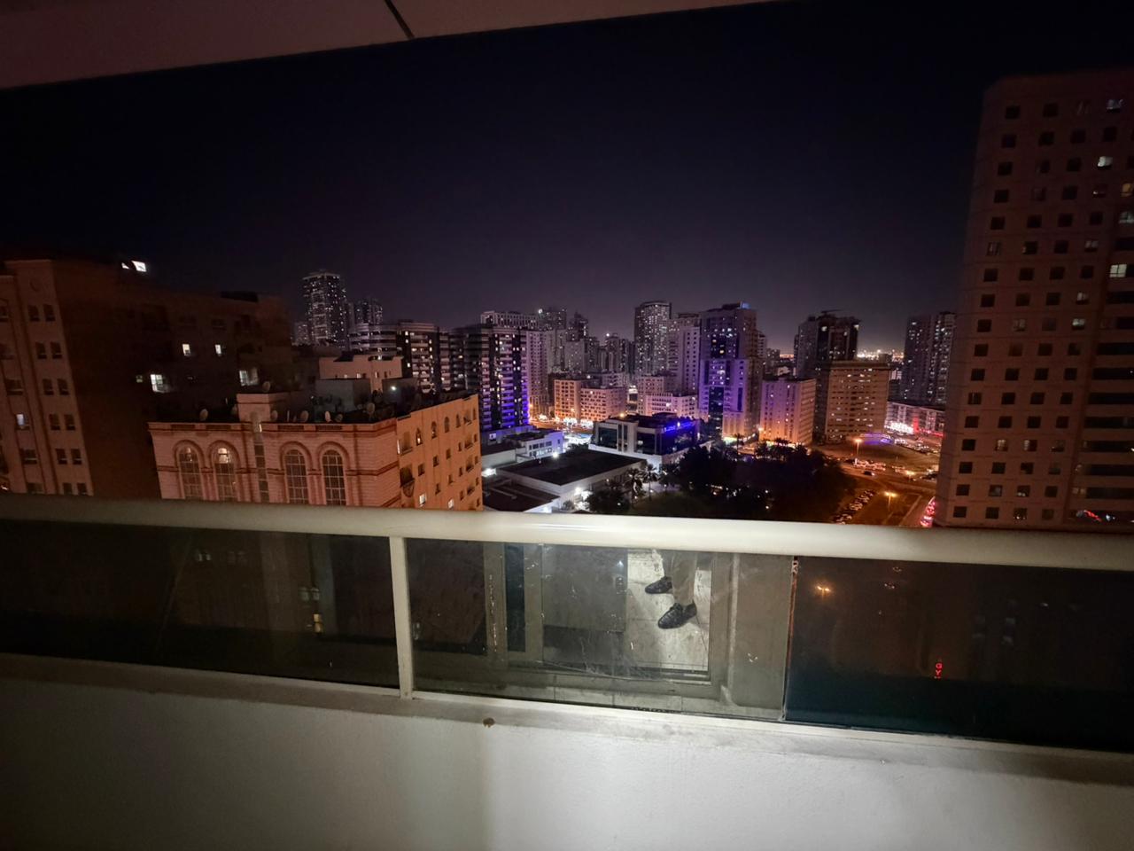 Furnished two-bedroom apartment with living room in Al Taawun for monthly rent. Prime location, central AC, comfortable living room, fully equipped ki
