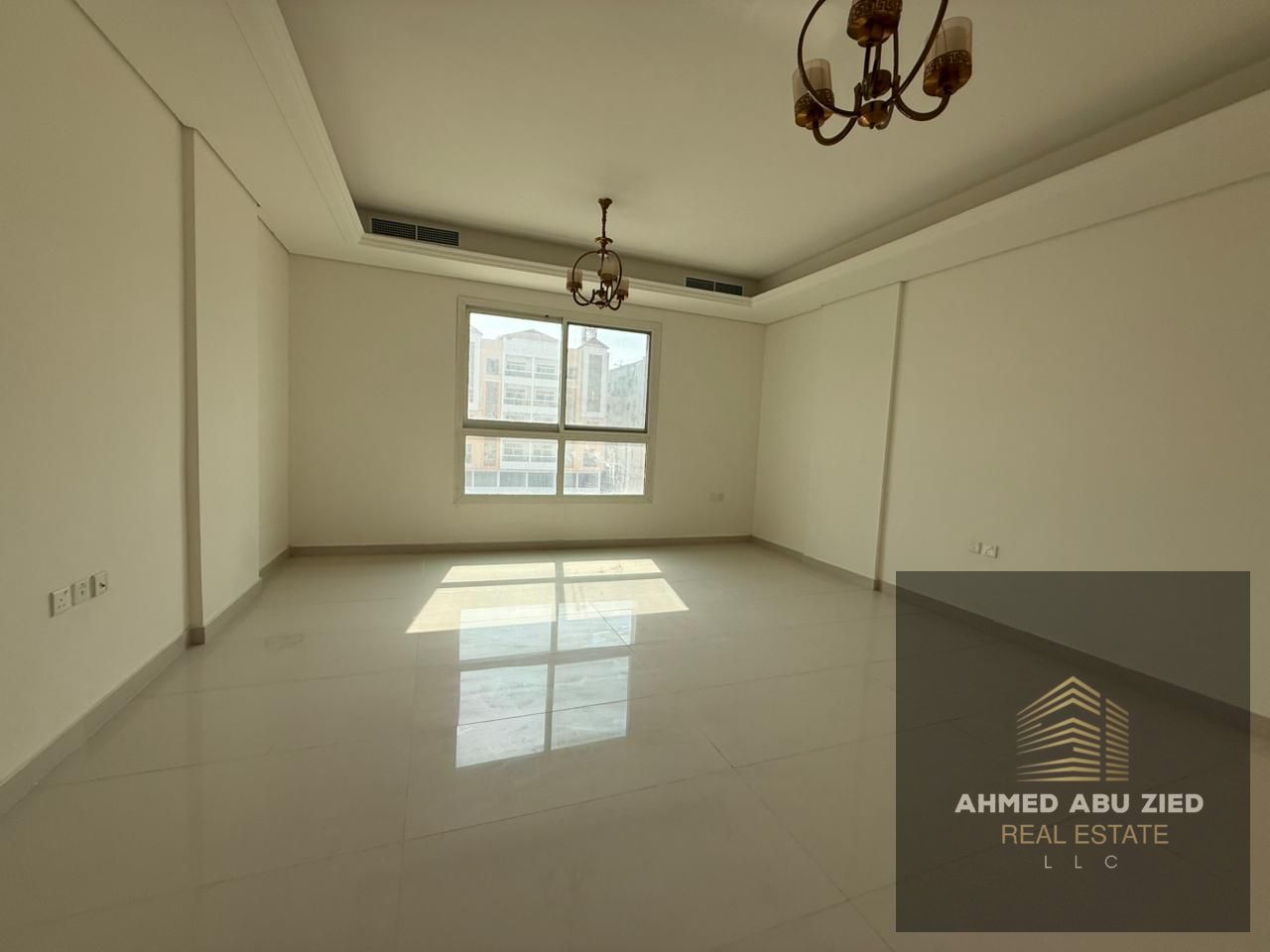 For annual rent: 3-bedroom apartment with living room, first tenant, in Al Muweihat 3, 3 bathrooms, balcony, central AC, wall cabinets, AED 58,000, 4