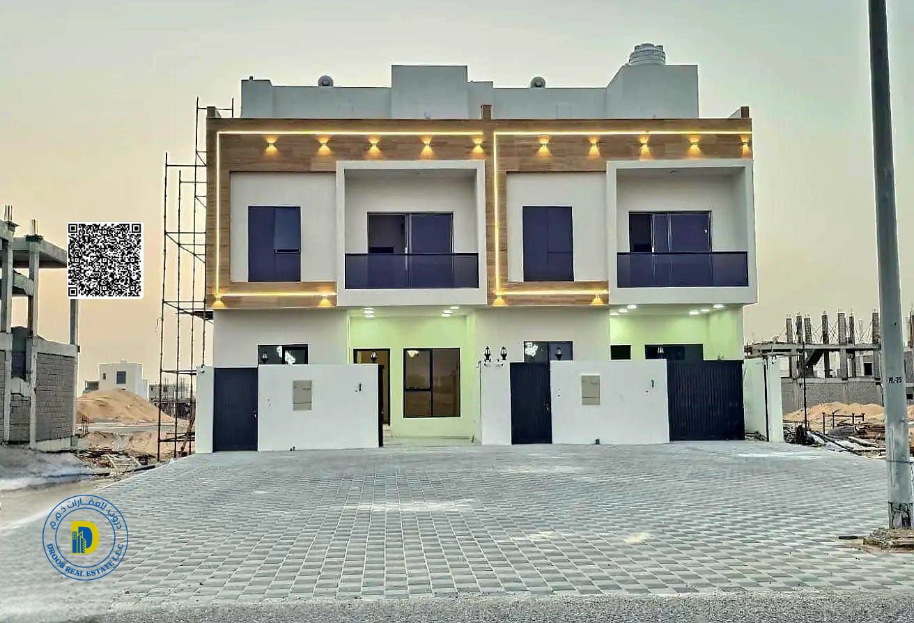 For sale townhouse 4BR with a roof , including registration fees, in Al Helio 2, Ajman. Bank financing . Freehold