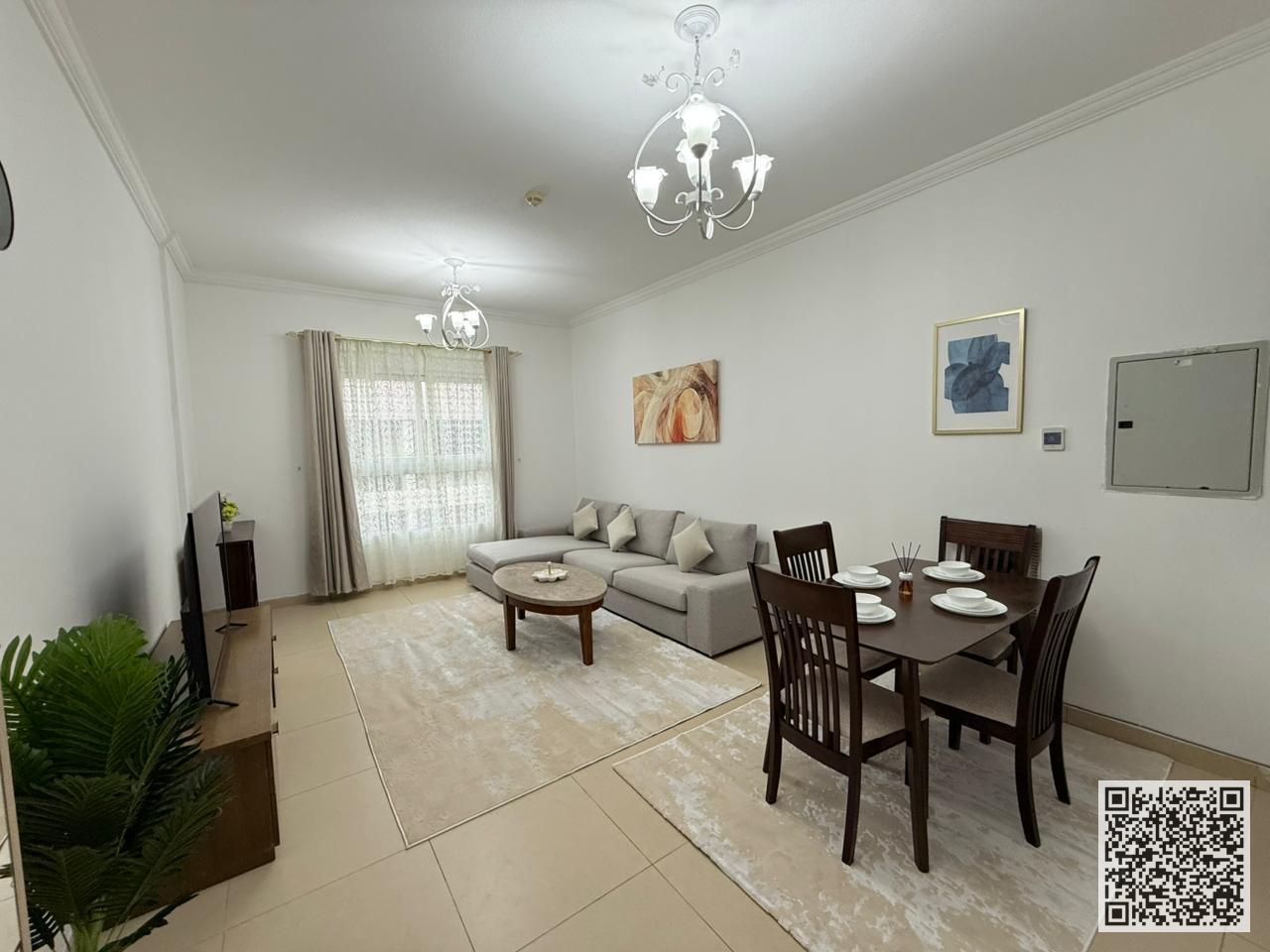 Luxury Apartment One bedroom and living room with a balcony offering an open view, available for monthly rent in Ajman, Al Yasmin Towers.