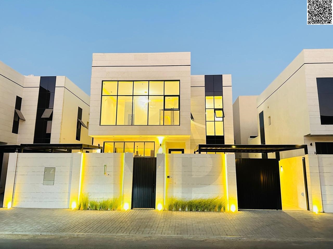A very luxurious modern villa with a full stone facade and a very luxurious interior with very luxurious hotel finishes,