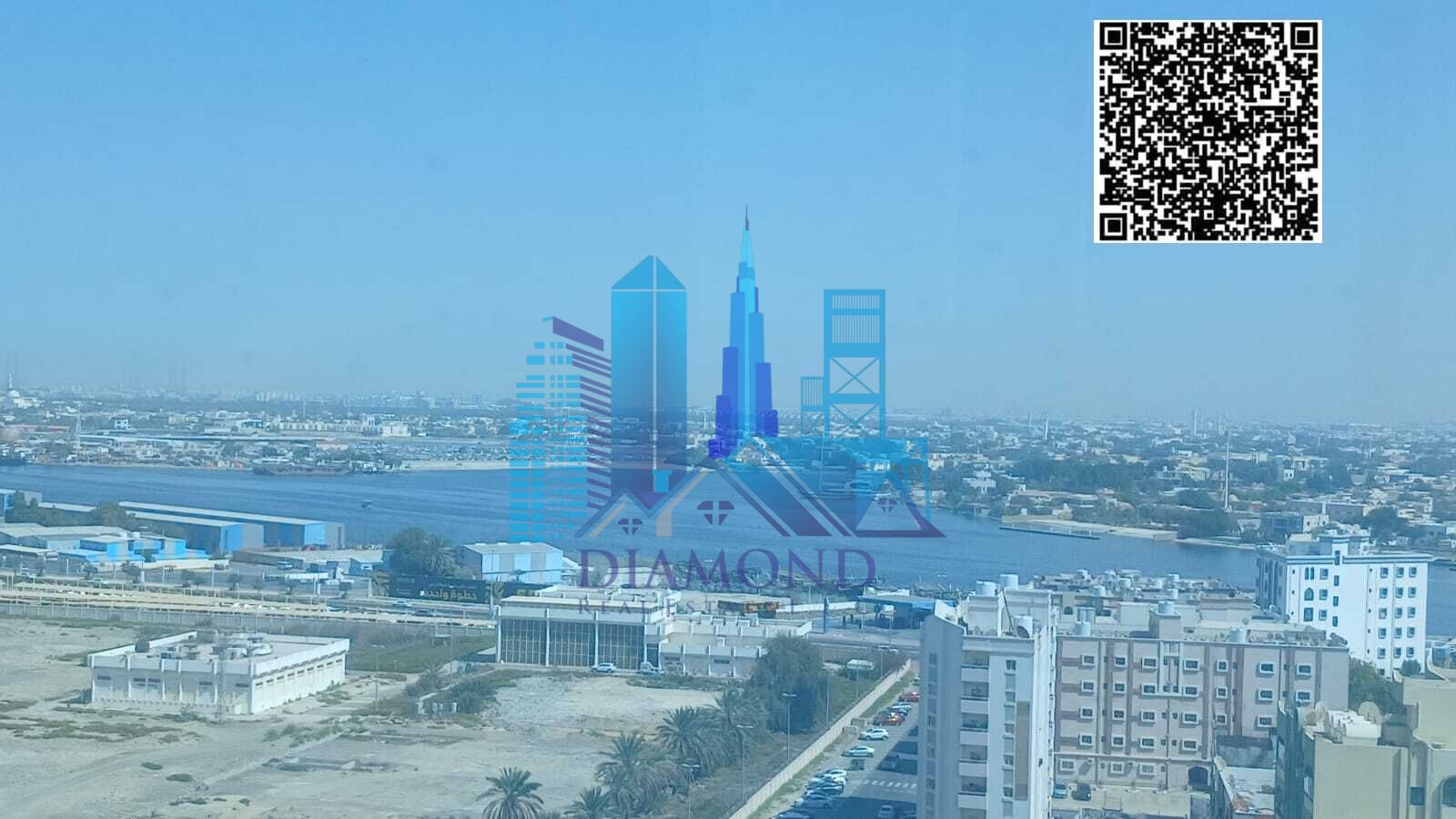 Office with a water view overlooking Ajman Creek for annual rent in Falcon Towers, Ajman Emirate.