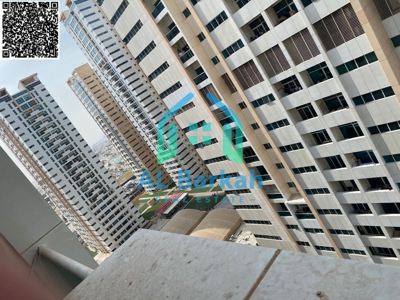 2-bedroom apartment for sale in Ajman One Towers, 124 sqm, 16th floor, open view, parking, fully maintained, ready to move in, AED 620K cash.