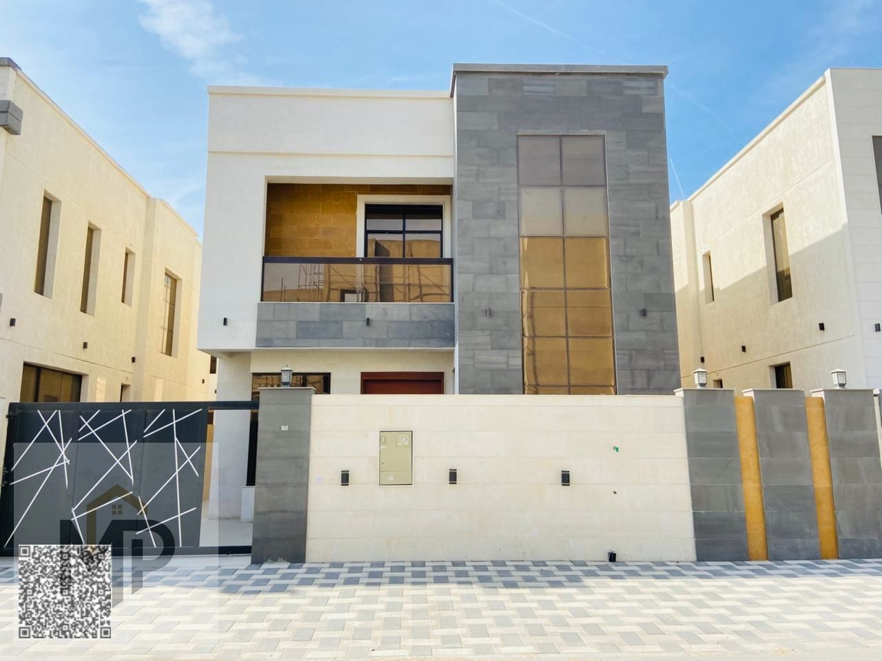 A villa with a price including registration and ownership fees on the main street, ready for living in the most prestigious areas of Ajman, freehold f