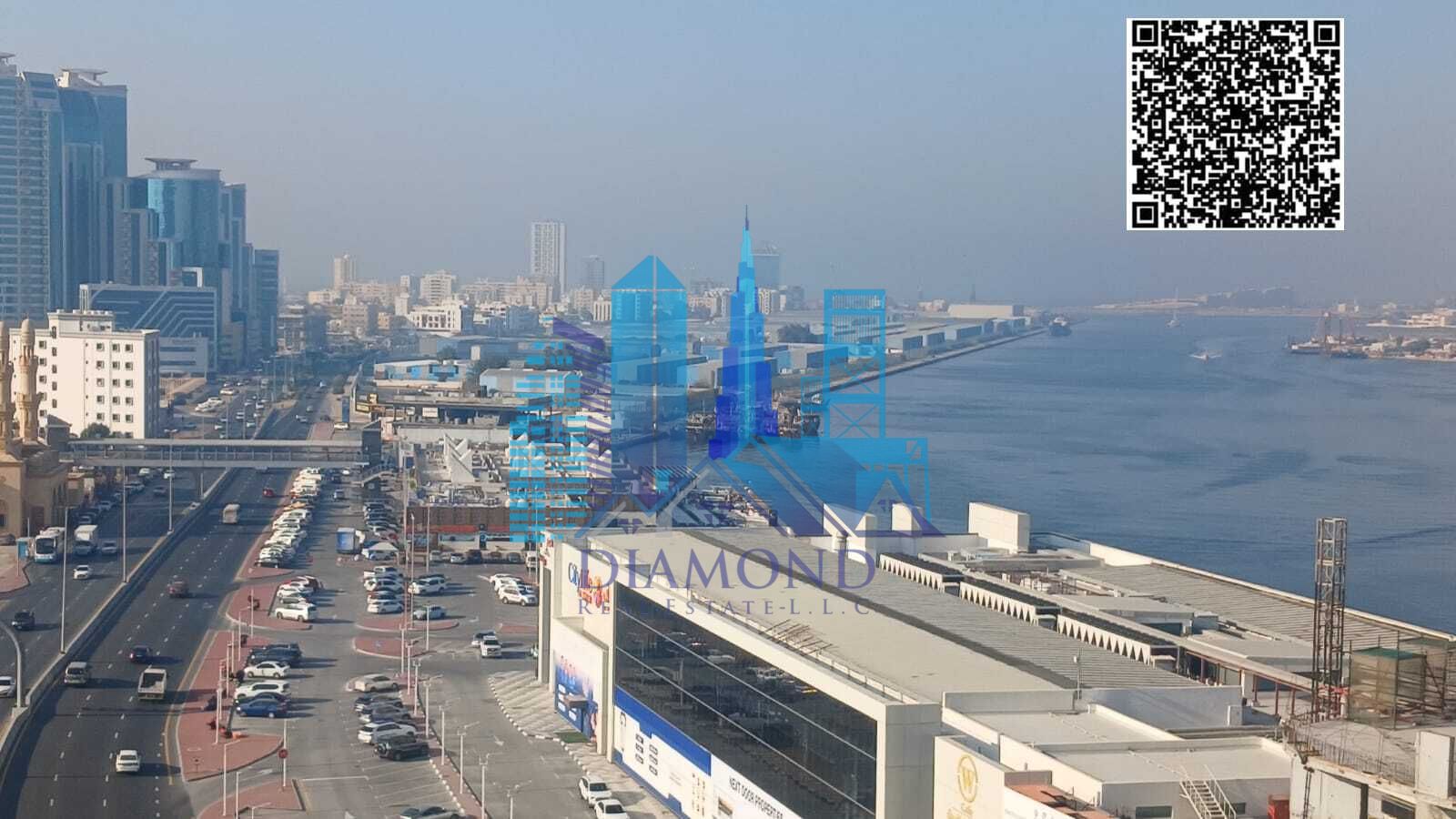 For sale in cash: furnished studio with a view of Ajman Creek in Oasis Towers. Freehold ownership for all nationalities. Ajman Emirate.