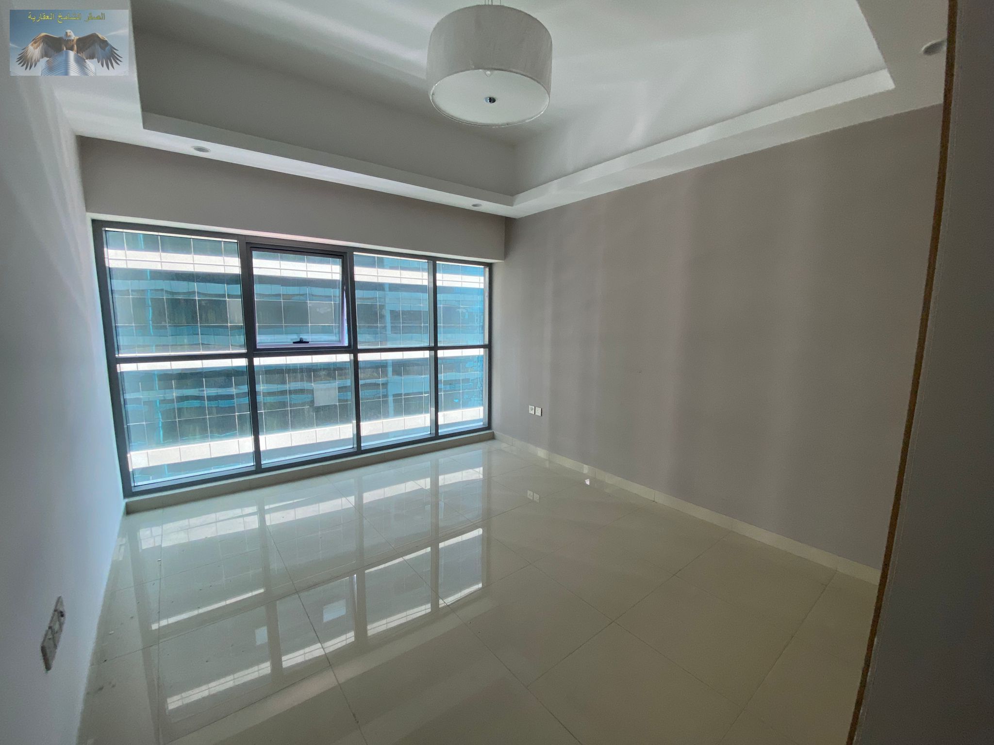 1BR apartment in Gulfa Tower Khalifa Street Al Rashidiya 1 Ajman built in wardrobes parking gym and pool annual rent