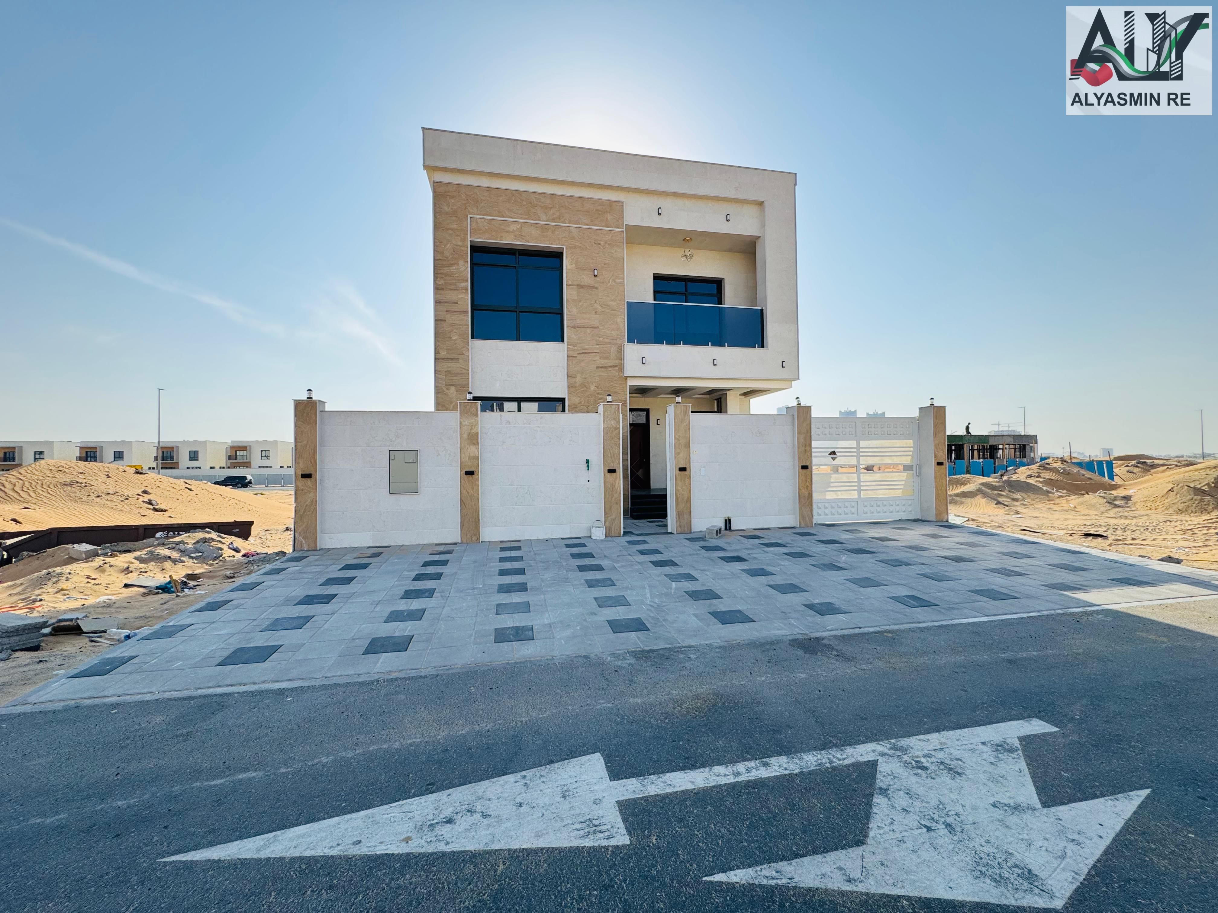 For sale, a two-story villa and a roof, at a price including registration fees, in a prime location near Azha Mall, freehold