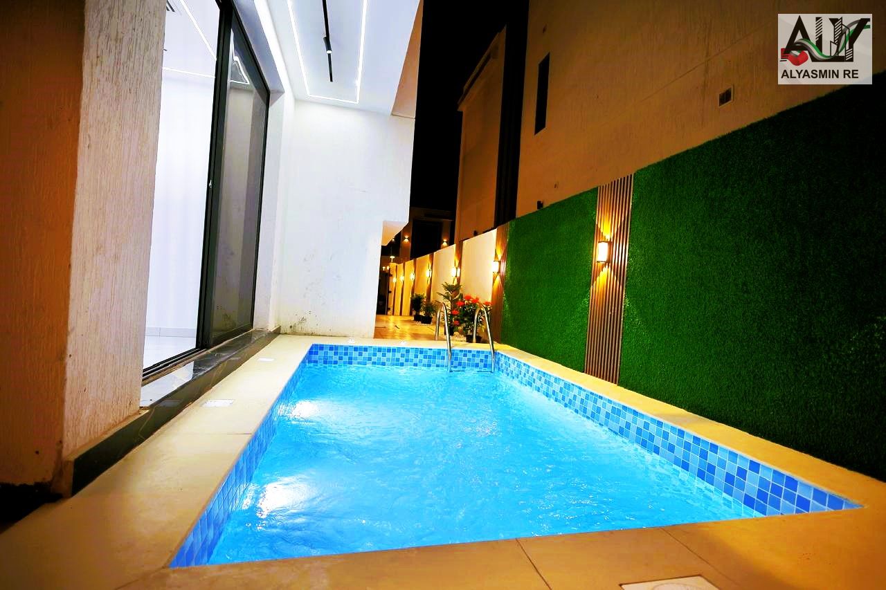 Own a villa, including registration and ownership fees, ground floor + first floor + roof, Al Zahia area, Ajman, freehold for all nationalities, 5 mas