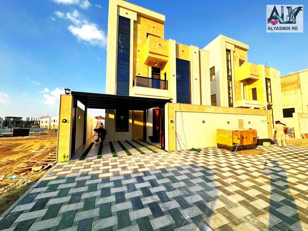 Own a villa with no registration fees. Ground floor + first floor + roof. 5 master bedrooms, 3 living rooms, a majlis, 2 kitchens. One minute from Str